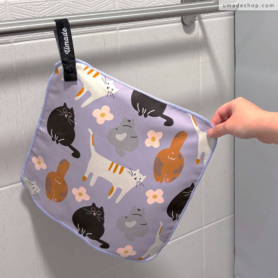 喵的擦一下快乾擦手巾組(2入)，可愛又搞笑的貓咪圖案，展示紫色擦手巾圖樣。